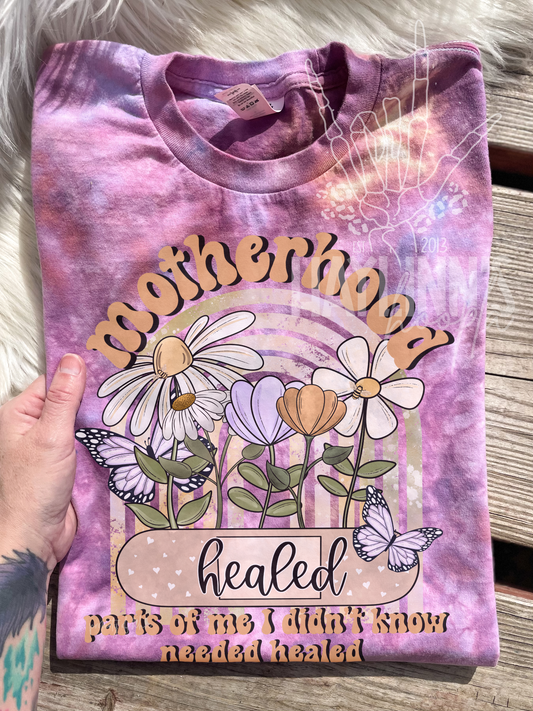 Motherhood Healed Parts of Me Tee